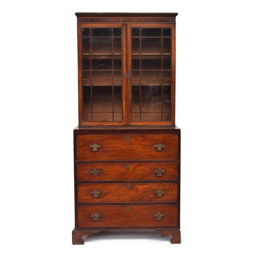 458 - A 19th century mahogany glazed secretaire bookcase, with two adjustable shelves, over a fitted secre... 