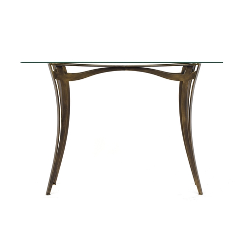 543 - A glass topped contemporary console table in the style of the Tom Faulkner Liberty table, 111cm wide... 