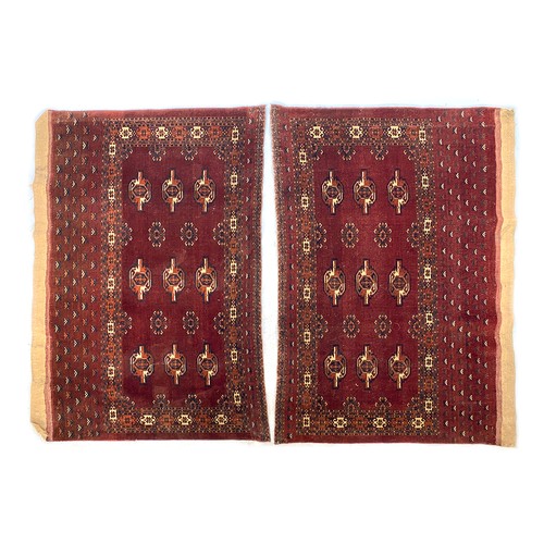 563 - A pair of Turkmen rugs, each approx. 168x105cm