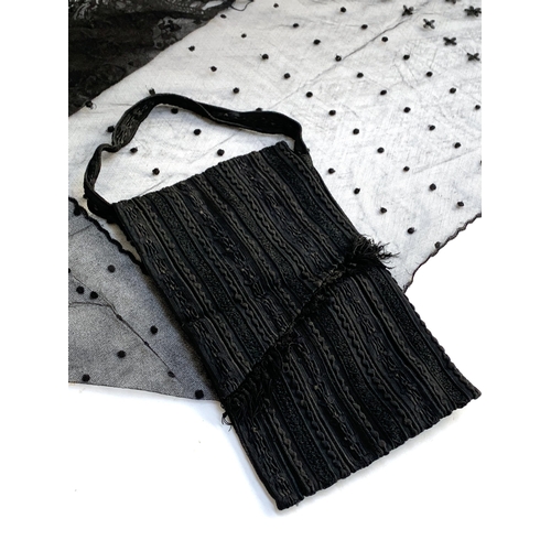 342 - A black lace scarf with applied decoration; together with a black handbag and a yellow mohair scarf ... 