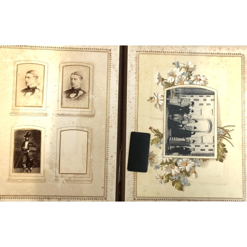 460 - A partly-filled Victorian photograph album in heavily embossed tooled leather binding. The 'Forget-M... 