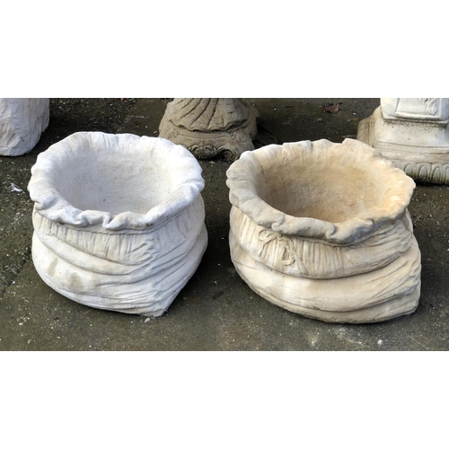 801 - A pair of composite stone plant pots in the form of sacks, 25cmH