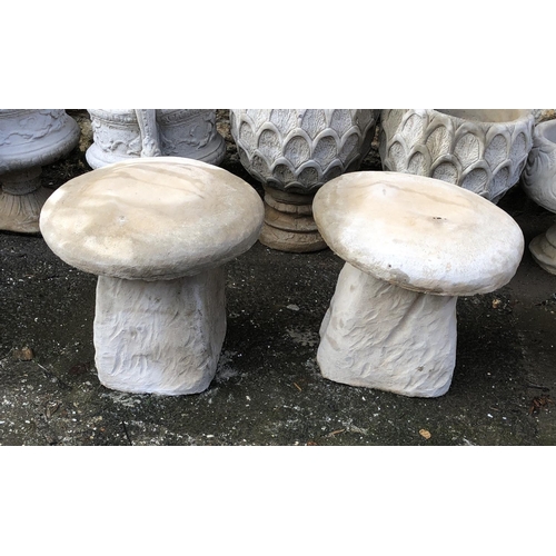 802 - A pair of composite stone staddle stones , 43cmH