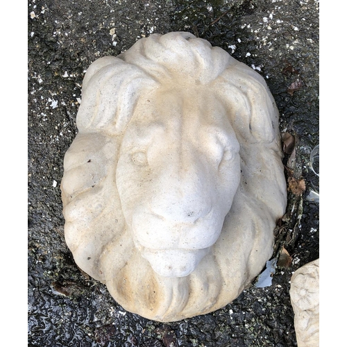 804 - A composite stone lion mask, 38cmH