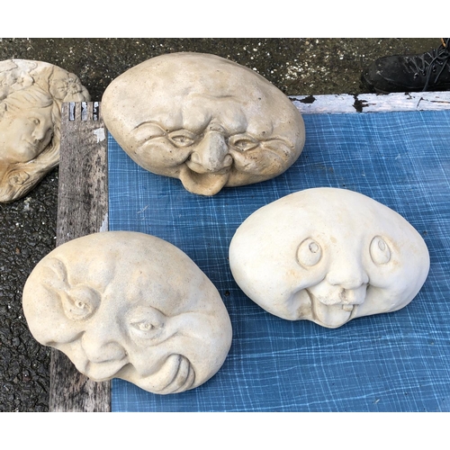 807 - Three composite stone gargoyles