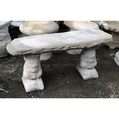 808 - A composite stone bench with squirrel supports, 43cmH