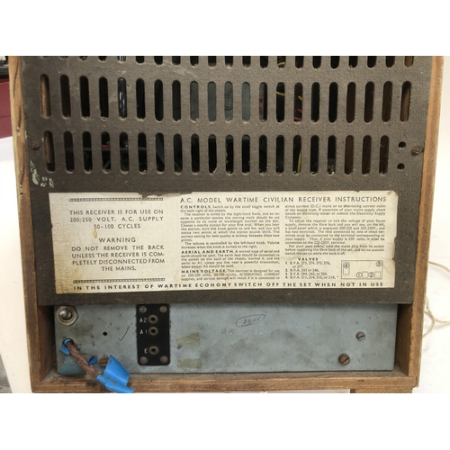 567 - A WWII radio receiver, bears instructions on back for A.C Model Wartime Civilian Receiver