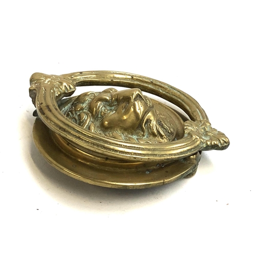 577 - A heavy brass lion mask door knocker, 16cmL