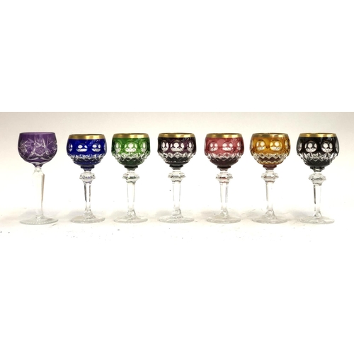 252 - A set of six small multi coloured Bohemian stemmed glasses, gilt rims, each 12.5cmH; together with o... 