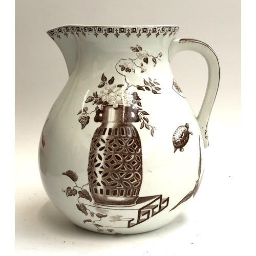 255 - A large Victorian Paragon transferware jug, c.1880, various Aesthetic movement motifs including tort... 