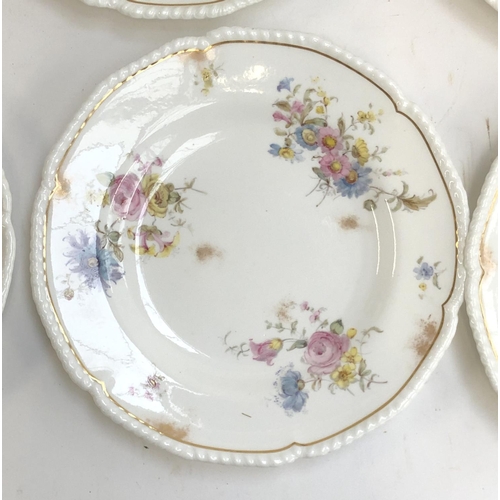 258 - A set of nine Royal Crown Derby dinner plates, hand painted floral spray design heightened in gilt, ... 