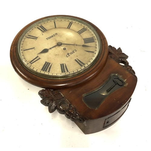 611 - An early 20th century wall clock from a Police station, by Tanner of Lewes, with Roman numerals, 11