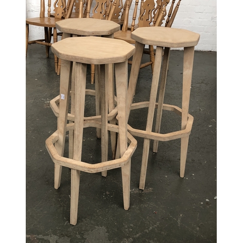 828 - Interior design interest: a set of three hand made plywood stools, octagonal seats, makers stamp to ... 