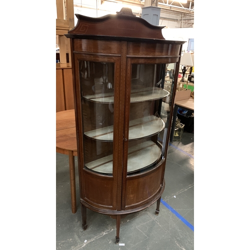 1106 - An Edwardian glazed display cabinet, with curved glass and square tapered legs, 92cmW 163cmH excludi... 