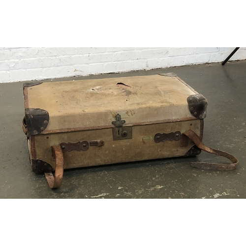 820 - A Victorian black canvas and leather bound travel trunk, the top inscribed 'D.J.C Glass', 93cmW; tog... 