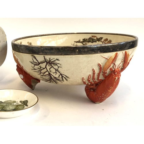 198 - A mixed lot to include Continental porcelain pots; Palissy style lobster footed bowl with white meta... 