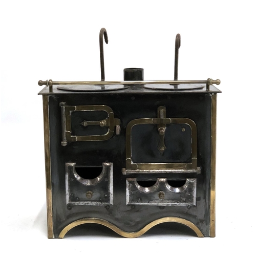 390 - A vintage miniature enamel and brass range cooker, with gas fitting, 32cmW, with miniature kettle, c... 