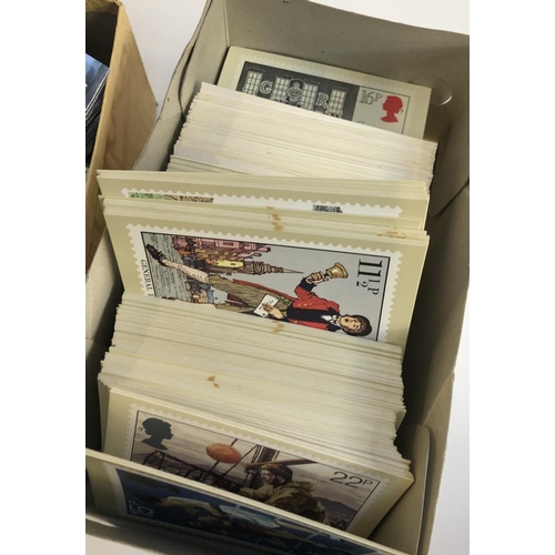 628 - A mixed lot in 4 boxes to include definitive and commemorative stamps, presentation packs, first day... 