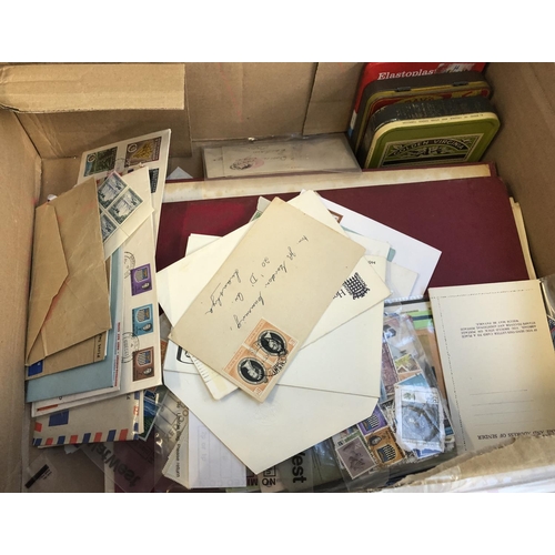 628 - A mixed lot in 4 boxes to include definitive and commemorative stamps, presentation packs, first day... 