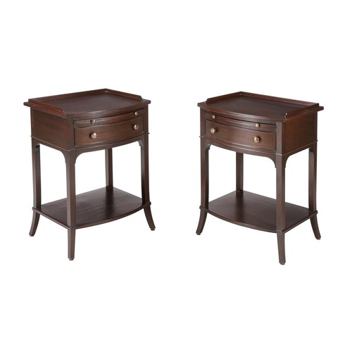 839 - A pair of modern bowfront bedside or side tables by Thomas Pheasant for Baker Furniture, each with s... 