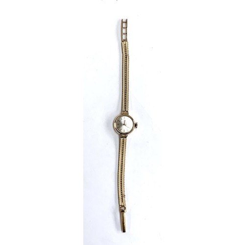 113 - A ladies Tissot wristwatch with 9ct gold strap, the dial 14mmD, gross weight 16.3g