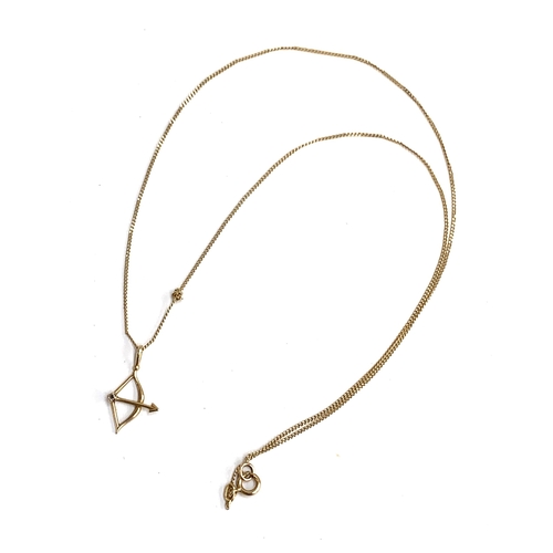 67 - A 9ct gold necklace with a Sagittarius bow and arrow pendant, 1.4g