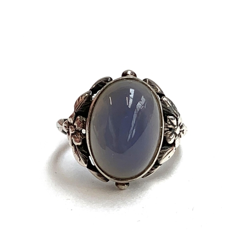 73 - A silver and chalcedony Arts and Crafts Bernard Instone style ring, size M 1/2, 4g; together with a ... 