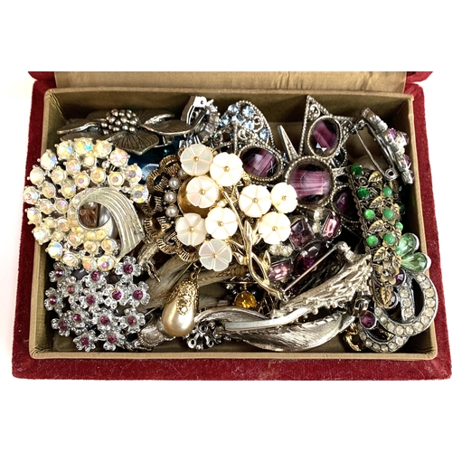 82 - A mixed lot of mainly costume brooches, to include Miracle, a paste bracelet, silver thimble and rin... 