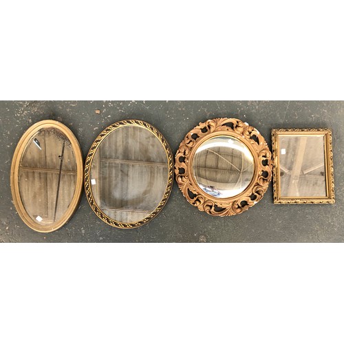 748 - A lot of four gilt style mirrors: two oval, one small rectangular, and one with scrolling pierced ge... 