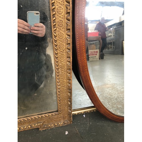 745 - A gilt framed mirror, with guilloche frieze within an egg and dart border, 95x74cm