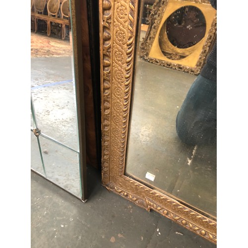 745 - A gilt framed mirror, with guilloche frieze within an egg and dart border, 95x74cm