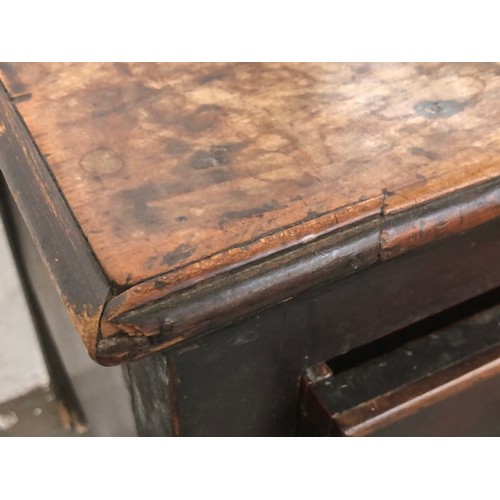 449 - An 18th century mahogany dresser base, the moulded top over three heavily cockbeaded drawers, on squ... 