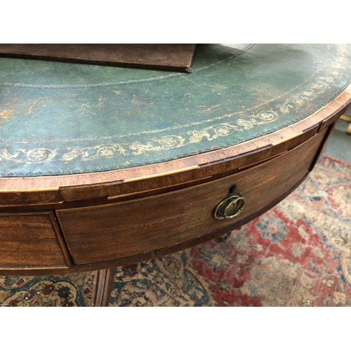 490 - A Regency mahogany drum top library table, the circular top with green leather skiver, four drawers ... 