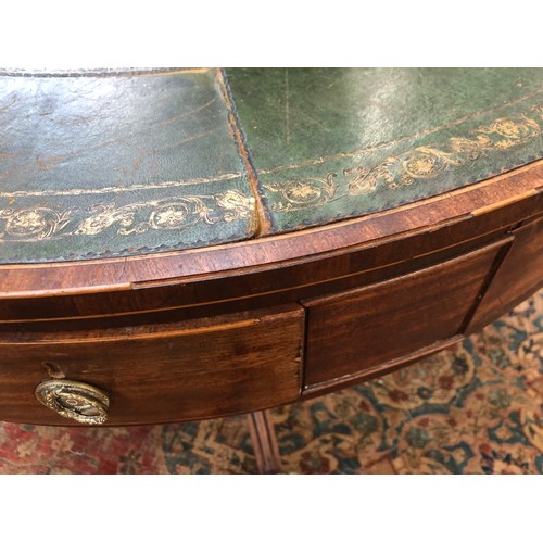 490 - A Regency mahogany drum top library table, the circular top with green leather skiver, four drawers ... 