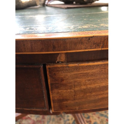 490 - A Regency mahogany drum top library table, the circular top with green leather skiver, four drawers ... 