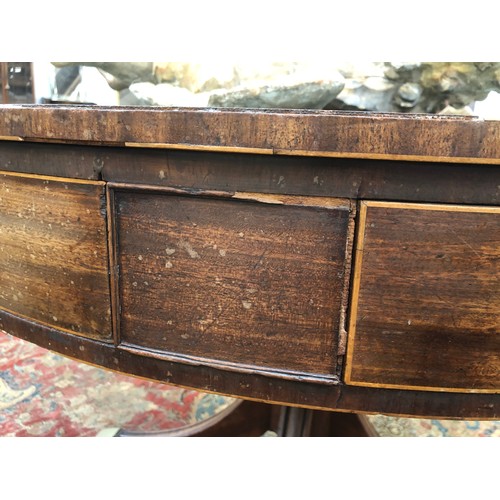 490 - A Regency mahogany drum top library table, the circular top with green leather skiver, four drawers ... 