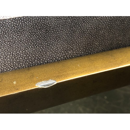 539 - A Ginger Brown contemporary shagreen TB COF METEOR coffee table, raised on a patinated metal base, R... 