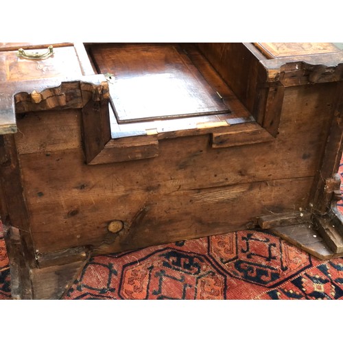 461 - A George II walnut lady's kneehole dressing table, c.1740, quarter veneered and cross banded top ove... 