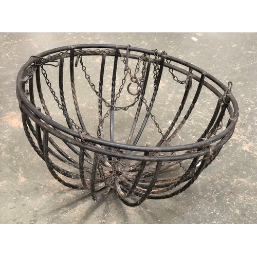 961 - A pair of wrought metal hanging planter baskets, each 46cmD