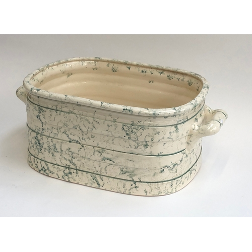 205 - Interior design interest: A large twin handled ceramic foot bath/planter with green spongeware desig... 