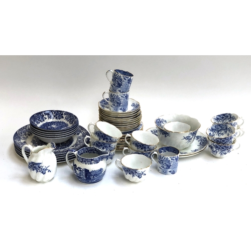 233 - A quantity of blue and white china to include Spode coffee cups and saucers, Ironstone etc