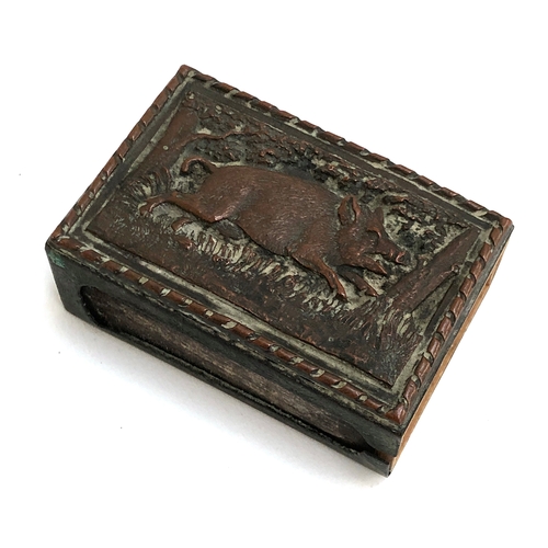 360 - A 19th century copper and brass matchbox holder depicting a running boar in relief, 6cmW