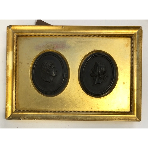 401 - Two late 18th century Wedgwood black basalt portrait cameo plaques, each 7.5x5.6cm, one depicting a ... 