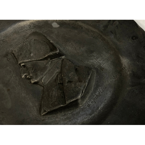 402 - A 19th century French pewter dish after François-Charles de Franoz depicting Napoleon, 24cmD