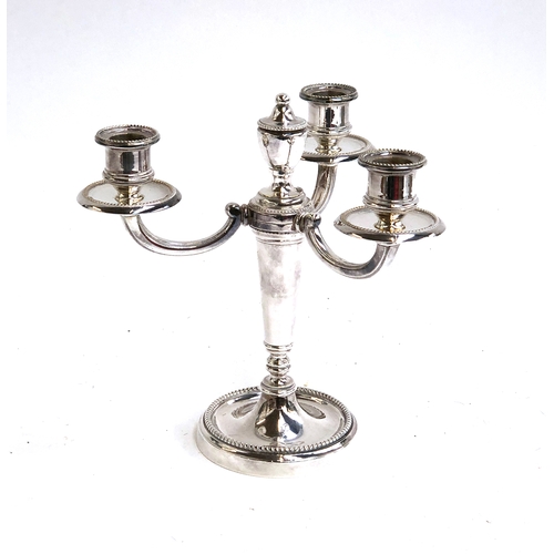 71 - A Christofle France 'Collection Gallia' silver plated three arm candlestick, 22cmH