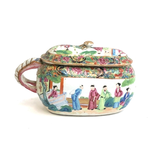 251 - A 19th century Chinese famille rose lidded chamber pot or bourdalou, 27cm long