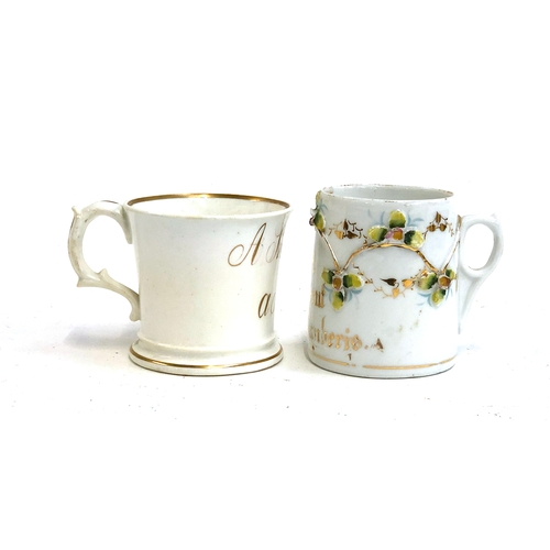 294 - A 19th century mug 'A Present From a Friend', 8cmH; together with a further Victorian souvenir mug, ... 