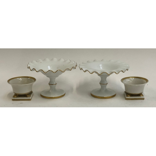 296 - A pair of Vista Alegre porcelain footed dishes with scalloped gilt edge, marked to base, each 9cmH; ... 