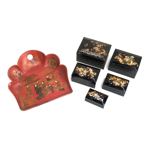 298 - A set of five graduating Chinese lacquered boxes, depicting dragons; Chinoiserie red lacquered papie... 