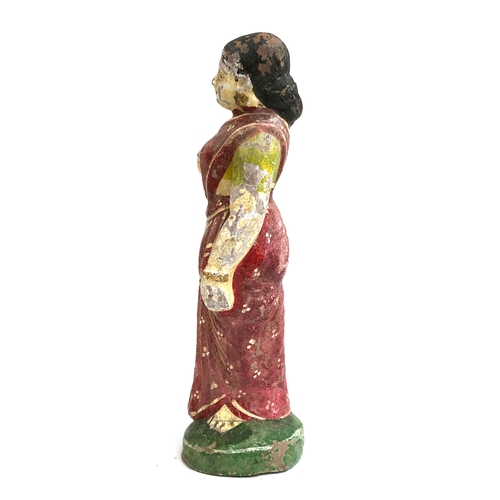 300 - An early 20th century Indian polychrome terracotta figure of lady, 23cmH